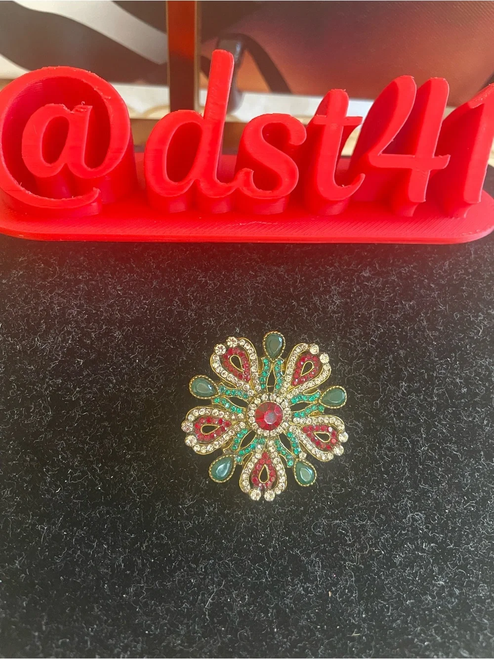 Gold-Tone Floral Brooch with Red and Green Stones
